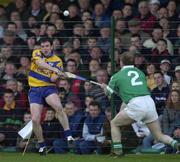 19 April 2001; Barry Murphy of Clare shoots goalwards under pressure from Stephen McDonagh of Limerick during the Allianz GAA National Hurling League Division 1A Round 5 match between Limerick and Clare at the Gaelic Grounds in Limerick. Photo by Ray McManus/Sportsfile