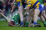 19 April 2001; TJ Ryan of Limerick protects his head  as players from both sides contest the loose ball during the Allianz GAA National Hurling League Division 1A Round 5 match between Limerick and Clare at the Gaelic Grounds in Limerick. Photo by Ray McManus/Sportsfile
