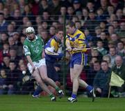 19 April 2001; Paul O'Grady of Limerick breaks his hurley as he attempts to block this clearance by David Hoey of Clare during the Allianz GAA National Hurling League Division 1A Round 5 match between Limerick and Clare at the Gaelic Grounds in Limerick. Photo by Ray McManus/Sportsfile