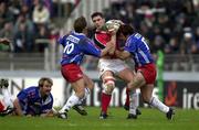 21 April 2001; David Wallace of Munster is tackled by Diego Dominguez, 10, and Cliff Mytton of Stade Francais during the Heineken European Cup Semi-Final match between Stade Francais and Munster at Stadium Lille Metropole in Lille, France. Photo by Matt Browne/Sportsfile