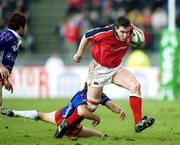 21 April 2001; David Wallace of Munster is tackled by Diego Dominguez of Stade Francais during the Heineken European Cup Semi-Final match between Stade Francais and Munster at Stadium Lille Metropole in Lille, France. Photo by Brendan Moran/Sportsfile   *** Local Caption ***