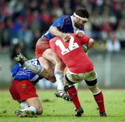 21 April 2001; Jason Holland of Munster is tackled by Richard Pool-Jones of Stade Francais during the Heineken European Cup Semi-Final match between Stade Francais and Munster at Stadium Lille Metropole in Lille, France. Photo by Brendan Moran/Sportsfile