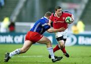 21 April 2001; Jason Holland of Munster is tackled by Pieter de Villiers of Stade Francais during the Heineken European Cup Semi-Final match between Stade Francais and Munster at Stadium Lille Metropole in Lille, France. Photo by Brendan Moran/Sportsfile