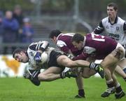 21 April 2001; Brendan Phillips of Sligo in action against Matthew Clancy and Derek Savage, right, of Galway during the Allianz GAA National Football League Division 1 Semi-Final match between Galway and Sligo in Dr Hyde Park in Roscommon. Photo by David Maher/Sportsfile