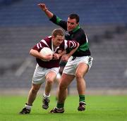 16 April 2001; Paul McGuinness of Crossmolina is tackled by Ivan Gibbons of Nemo Rangers during the AIB All-Ireland Senior Club Football Championship Final match between Crossmolina and Nemo Rangers at Croke Park in Dublin. Photo by Ray McManus/Sportsfile