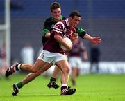 16 April 2001; Michael Moyles of Crossmolina is tackled by Derek Kavanagh of Nemo Rangers during the AIB All-Ireland Senior Club Football Championship Final match between Crossmolina and Nemo Rangers at Croke Park in Dublin. Photo by Ray McManus/Sportsfile