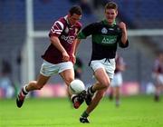 16 April 2001; Michael Moyles of Crossmolina races clear of Derek Kavanagh of Nemo Rangers during the AIB All-Ireland Senior Club Football Championship Final match between Crossmolina and Nemo Rangers at Croke Park in Dublin. Photo by Ray McManus/Sportsfile