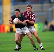 16 April 2001; Joe Kavanagh of Nemo Rangers is tackled by Peadar Gardiner of Crossmolina during the AIB All-Ireland Senior Club Football Championship Final match between Crossmolina and Nemo Rangers at Croke Park in Dublin. Photo by Damien Eagers/Sportsfile