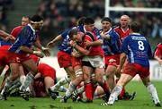 21 April 2001; Mick Galwey of Munster is tackled by David Auradou of Stade Francais during the Heineken European Cup Semi-Final match between Stade Francais and Munster at Stadium Lille Metropole in Lille, France. Photo by Brendan Moran/Sportsfile