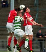 22 April 2001, Sean Francis of Shamrock Rovers competes for possession against Declan Daly, left, and Kelvin Flanagan of Cork City during the Eircom League Premier Division match between Shamrock Rovers and Cork City at Morton Stadium in Dublin. Photo by Pat Murphy/Sportsfile