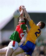 22 April 2001; James Nallen of Mayo in action against Gary Cox of Roscommon during the Allianz National Football League Semi Final match between Mayo and Roscommon at Markievicz Park in Sligo. Photo by Damien Eagers/Sportsfile