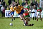 22 April 2001; Conor Connelly of Roscommon is fouled by Colm McManaman of Mayo, for which McManaman was sent off, during the Allianz National Football League Semi Final match between Mayo and Roscommon at Markievicz Park in Sligo. Photo by Damien Eagers/Sportsfile