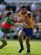 22 April 2001; Peter Mahon of Roscommon is challenged by Aidan Higgins of Mayo during the Allianz National Football League Semi Final match between Mayo and Roscommon at Markievicz Park in Sligo. Photo by Damien Eagers/Sportsfile