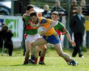 22 April 2001; Nigel Dineen of Roscommon is challenged by Aidan Higgins, left, and Ray Connelly of Mayo during the Allianz National Football League Semi Final match between Mayo and Roscommon at Markievicz Park in Sligo. Photo by Damien Eagers/Sportsfile