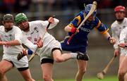 15 April 2001; Wayne O'Gorman of Wicklow is tackled by Richie Hoban of Kildare during the Leinster Senior Hurling Championship First Preliminary Round match between Wicklow and Kildare at Pearse Park in Arklow, Wicklow. Photo by Ray McManus/Sportsfile