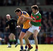 22 April 2001; Francie Grehan of Roscommon holds off the challenge of James Gill of Mayo during the Allianz National Football League Semi Final match between Mayo and Roscommon at Markievicz Park in Sligo. Photo by Damien Eagers/Sportsfile