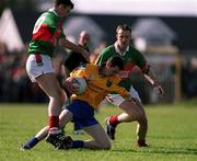 22 April 2001; John Whyte of Roscommon is tackled by Maurice Sheridan, left, and David Brady of Mayo during the Allianz National Football League Semi Final match between Mayo and Roscommon at Markievicz Park in Sligo. Photo by Damien Eagers/Sportsfile