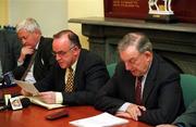 23 April 2001; Football Association of Ireland President Pat Quigley, centre, accompanied by FAI Treasurer, Brendan Menton, left, and Chairman of the National League Michael Hyland, reads a statement at a press conference after the FAI Board of Management meeting at the FAI Offices in Merrion Square, Dublin. Photo by Damien Eagers/Sportsfile