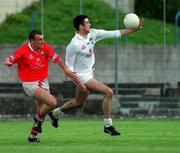 22 April 2001; Dermot Earley of Kildare in action against John Miskella of Cork during the Allianz GAA National Football League Division 2 Semi-Final match between Cork and Kildare at McDonagh Park in Nenagh, Tipperary. Photo by Ray McManus/Sportsfile