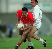 22 April 2001; Martin Cronin of Cork gets past Patrick Murray of Kildare during the Allianz GAA National Football League Division 2 Semi-Final match between Cork and Kildare at McDonagh Park in Nenagh, Tipperary. Photo by Ray McManus/Sportsfile