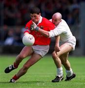 22 April 2001; Fionan Murray of Cork in action against David Hughes of Kildare during the Allianz GAA National Football League Division 2 Semi-Final match between Cork and Kildare at McDonagh Park in Nenagh, Tipperary. Photo by Ray McManus/Sportsfile