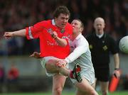 22 April 2001; Alan Cronin of Cork in action against Colm O'Reilly of Kildare during the Allianz GAA National Football League Division 2 Semi-Final match between Cork and Kildare at McDonagh Park in Nenagh, Tipperary. Photo by Ray McManus/Sportsfile