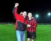 26 April 2001; Sean Prunty of Longford Town celebrates with a supporter after the FAI Harp Lager Cup Semi-Final Replay match between Longford Town and Waterford Town at Flancare Park in Longford. Photo by Damien Eagers/Sportsfile