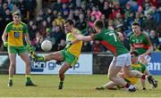 28 February 2016; Frank McGlynn, Donegal, in action against Shane Nally, Mayo. Allianz Football League, Division 1, Round 3, Donegal v Mayo, MacCumhaill Park, Ballybofey, Co. Donegal. Picture credit: Oliver McVeigh / SPORTSFILE