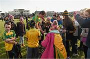 28 February 2016; Michael Murphy, Donegal captain, signs autographs for fans on the field. Allianz Football League, Division 1, Round 3, Donegal v Mayo, MacCumhaill Park, Ballybofey, Co. Donegal. Picture credit: Oliver McVeigh / SPORTSFILE