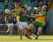 28 February 2016; Conor Loftus, Mayo, in action against Rory Kavanagh and Anthony Thompson, Donegal. Allianz Football League, Division 1, Round 3, Donegal v Mayo, MacCumhaill Park, Ballybofey, Co. Donegal. Picture credit: Oliver McVeigh / SPORTSFILE