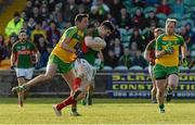 28 February 2016; Conor Loftus, Mayo, in action against Rory Kavanagh, Donegal. Allianz Football League, Division 1, Round 3, Donegal v Mayo, MacCumhaill Park, Ballybofey, Co. Donegal. Picture credit: Oliver McVeigh / SPORTSFILE