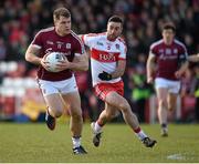 28 February 2016; Eddie Hoare, Galway, in action against Mark Craig, Derry. Allianz Football League, Division 2, Round 3, Derry v Galway. Celtic Park, Derry. Picture credit: Philip Fitzpatrick / SPORTSFILE
