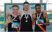 28 February 2016; Winner of the Men's 60m event, Craig Lynch, centre, Shercock AC, Co.Cavan, with second placed Keith Pike, left, Clonliffe Harriers AC, Dublin and right, third placed Christopher Sibanda, Clonliffe Harriers AC, Dublin. The GloHealth National Senior Indoor Championships Senior Track & Field. AIT Arena, Athlone, Co. Westmeath.Picture credit: Tomás Greally / SPORTSFILE  *