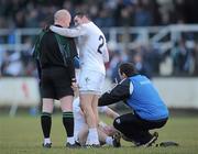 7 February 2010; Kildare's Andriú McLoughlin takes the opportunity to have a chat with referee Derek Fahy as his team-mate Emmet Bolton is attended to by the team physio. Allianz GAA Football National League, Division 2, Round 1, Kildare v Down. St Conleth's Park, Newbridge, Co. Kildare. Picture credit: Brian Lawless / SPORTSFILE