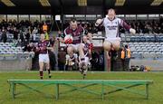7 February 2010; Westmeath's Michael Ennis and Gary Connaughton jump over the bench for the team photograph. Allianz GAA Football National League, Division 2, Round 1, Westmeath v Donegal. Cusack Park, Mullingar, Co. Westmeath. Photo by Sportsfile