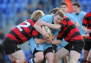 9 February 2010; Denis Coulson, St Michael's, in action against Ross Bailey Kearney, left, and Michael Triggs, Kilkenny College. Leinster Schools Junior Cup, 1st Round, St Michael's v Kilkenny College, Donnybrook Stadium, Donnybrook, Dublin. Photo by Sportsfile
