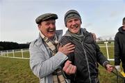 3 February 2010; Joint Owner Basil Holian, left, celebrates with Jack Buckley, handler, after Adios Alonso won the Boylesports.com Derby. 85th National Coursing Meeting - Wednesday, Powerstown Park, Clonmel, Co. Tipperary. Picture credit: Brian Lawless / SPORTSFILE