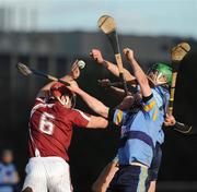 10 February 2010; Joey Boland, left, and David Lyng, UCD, contest a high ball against John Lee, NUI Galway. Ulster Bank Fitzgibbon Cup Round 2, Univercity College Dublin v National University of Ireland, Galway, Belfield, Dublin. Picture credit: Daire Brennan / SPORTSFILE