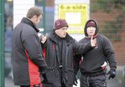 12 January 2010; Ulster Head Coach, Brian McLaughlin, centre, along with Jeremy Davidson, assistant forward coach, left, and Neil Doak assistant backs coach, in action during squad training ahead of their Heineken Cup game against Edinburgh on Friday night. Ashfield Boys School, Belfast, Co. Antrim. Picture credit: Oliver McVeigh / SPORTSFILE