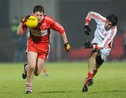 6 February 2010; James Kielt, Derry, in action against Joe McMahon, Tyrone. Allianz GAA Football National League, Division 1, Round 1, Derry v Tyrone, Celtic Park, Derry. Picture credit: Oliver McVeigh / SPORTSFILE
