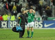 13 February 2010; Ireland's Keith Earls with Team Physio Cameron Steele at the final whistle. RBS Six Nations Rugby Championship, France v Ireland, Stade de France, Saint Denis, Paris, France. Picture credit: Brian Lawless / SPORTSFILE