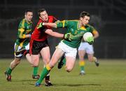 13 February 2010; Mark Ward, Meath, in action against Kalum King, Down. Allianz National Football League, Division 2, Round 2, Down v Meath, Pairc Esler, Newry, Co. Down. Picture credit: Oliver McVeigh / SPORTSFILE
