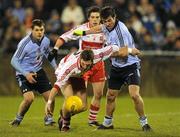 13 February 2010; Gerard O'Kane, Derry, in action against Michael Mac Auley, Dublin. Allianz National Football League, Division 1, Round 2, Dublin v Derry, Parnell Park, Dublin. Picture credit: Pat Murphy / SPORTSFILE