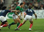13 February 2010; David Wallace, Ireland, is tackled by Mathieu Bastareaud, left, and Vincent Clerc, France. RBS Six Nations Rugby Championship, France v Ireland, Stade de France, Saint Denis, Paris, France. Picture credit: Brian Lawless / SPORTSFILE