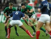 13 February 2010; Stephen Ferris, supported by Ronan O'Gara, left, Ireland, in action against theirry Dusautoir, France. RBS Six Nations Rugby Championship, France v Ireland, Stade de France, Saint Denis, Paris, France. Picture credit: Brian Lawless / SPORTSFILE