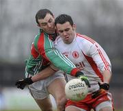 14 February 2010; Kyle Coney, Tyrone, in action against Keith Higgins, Mayo. Allianz National Football League, Division 1, Round 2, Tyrone v Mayo, Healy Park, Omagh, Co. Tyrone. Picture credit: Oliver McVeigh / SPORTSFILE