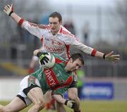 14 February 2010; Ronan McGarrity, Mayo, in action against Aidan Cassidy, Tyrone. Allianz National Football League, Division 1, Round 2, Tyrone v Mayo, Healy Park, Omagh, Co. Tyrone. Picture credit: Oliver McVeigh / SPORTSFILE