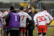 14 February 2010; Tyrone manager Mickey Harte with his players in the centre of the pitch after the game. Allianz National Football League, Division 1, Round 2, Tyrone v Mayo, Healy Park, Omagh, Co. Tyrone. Picture credit: Oliver McVeigh / SPORTSFILE