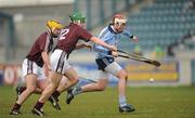 14 February 2010; Simon Lambert, Dublin, in action against David Burke, 12, and Ger Farragher, Galway. Walsh Cup Final, Dublin v Galway, Parnell Park, Dublin. Picture credit: Ray McManus / SPORTSFILE