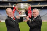 15 February 2010; Uachtarán Chumann Lúthchleas Gael Críostóír Ó Cuana, right, and Donal Horgan, Managing Director, SuperValu, with the Sam Maguire Cup at the announcement of a new three year GAA Football Championship partnership with SuperValu and its 231 retail partners, beginning for the 2010 season. Croke Park, Dublin. Picture credit: Ray McManus / SPORTSFILE